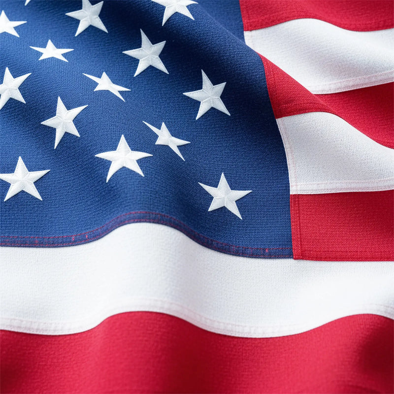 Close-up of an American flag with stars and stripes.
